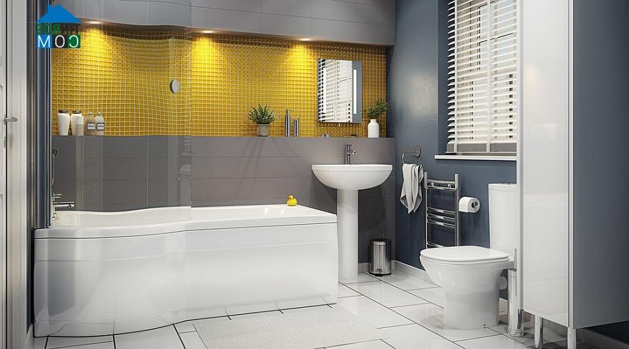 Hai gam màu vàng và xám tạo ra phòng tắm hiện đại