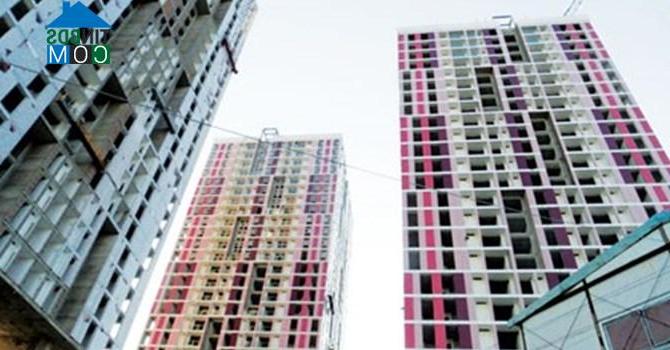 Ảnh Giá nhà “cõng” thêm phí bảo lãnh, người mua như ngồi trên lửa