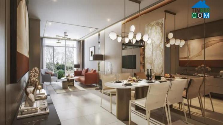 Không gian bếp và khách được thiết kế liền mạch, tạo sự rộng rãi và gắn kết