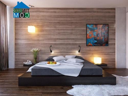 Ảnh Thiết kế phòng ngủ ấm áp với một bức tường gỗ