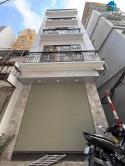 Nhà mới ở luôn phố Định Công Thượng, 5 tầng Thang máy, ô tô, chỉ 8,85 tỷ.