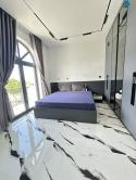 Bán nhà 5 tầng mới 100% mặt tiền Hoàng Quốc Việt – thang máy, full nội thất, 12 tỷx